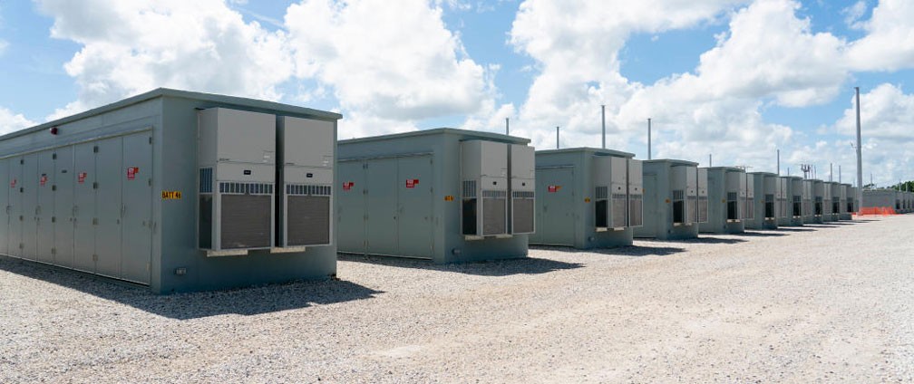 Battery energy storage units on a gravel grounds
